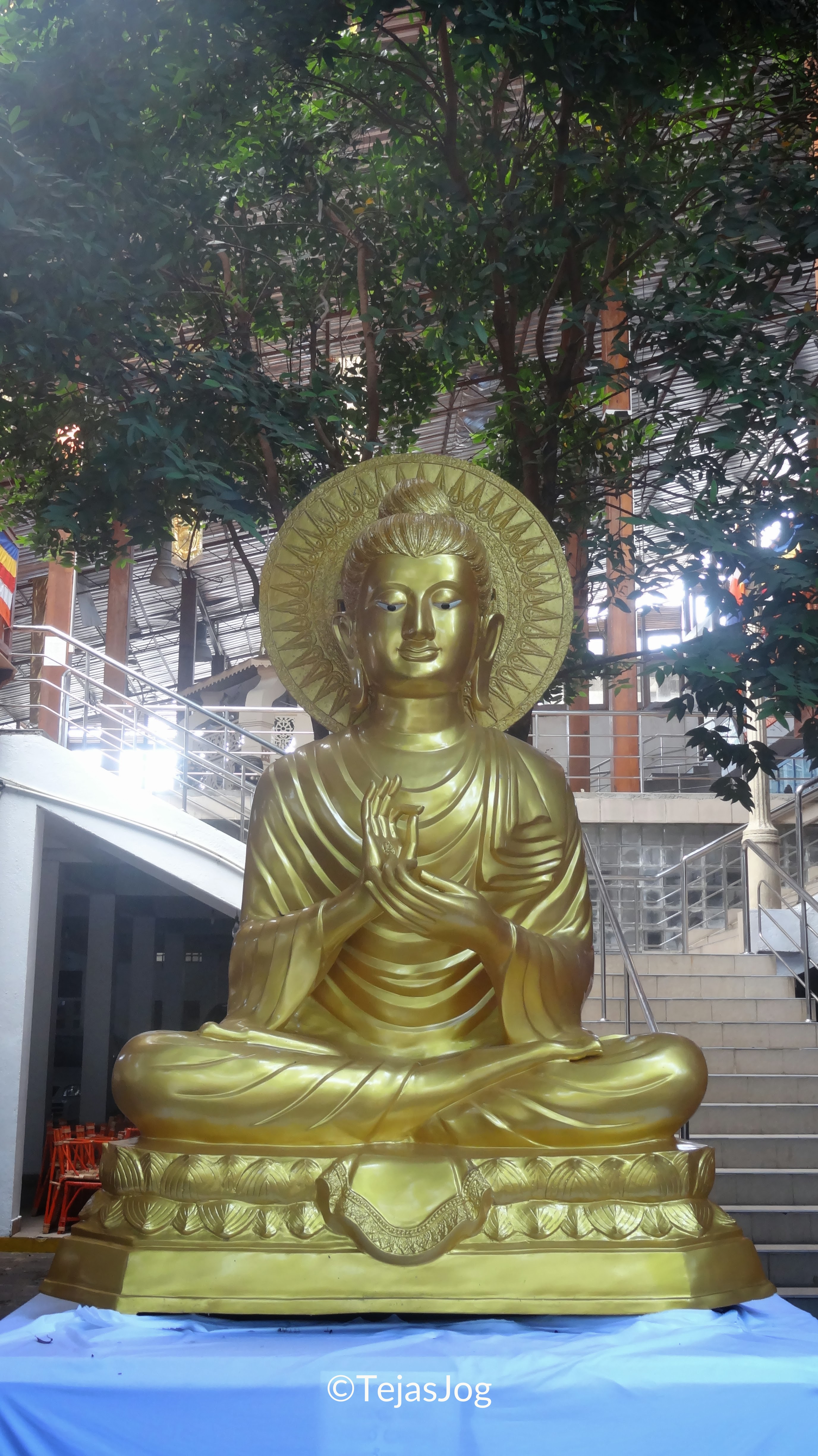 Golden Buddha statue in the courtyard