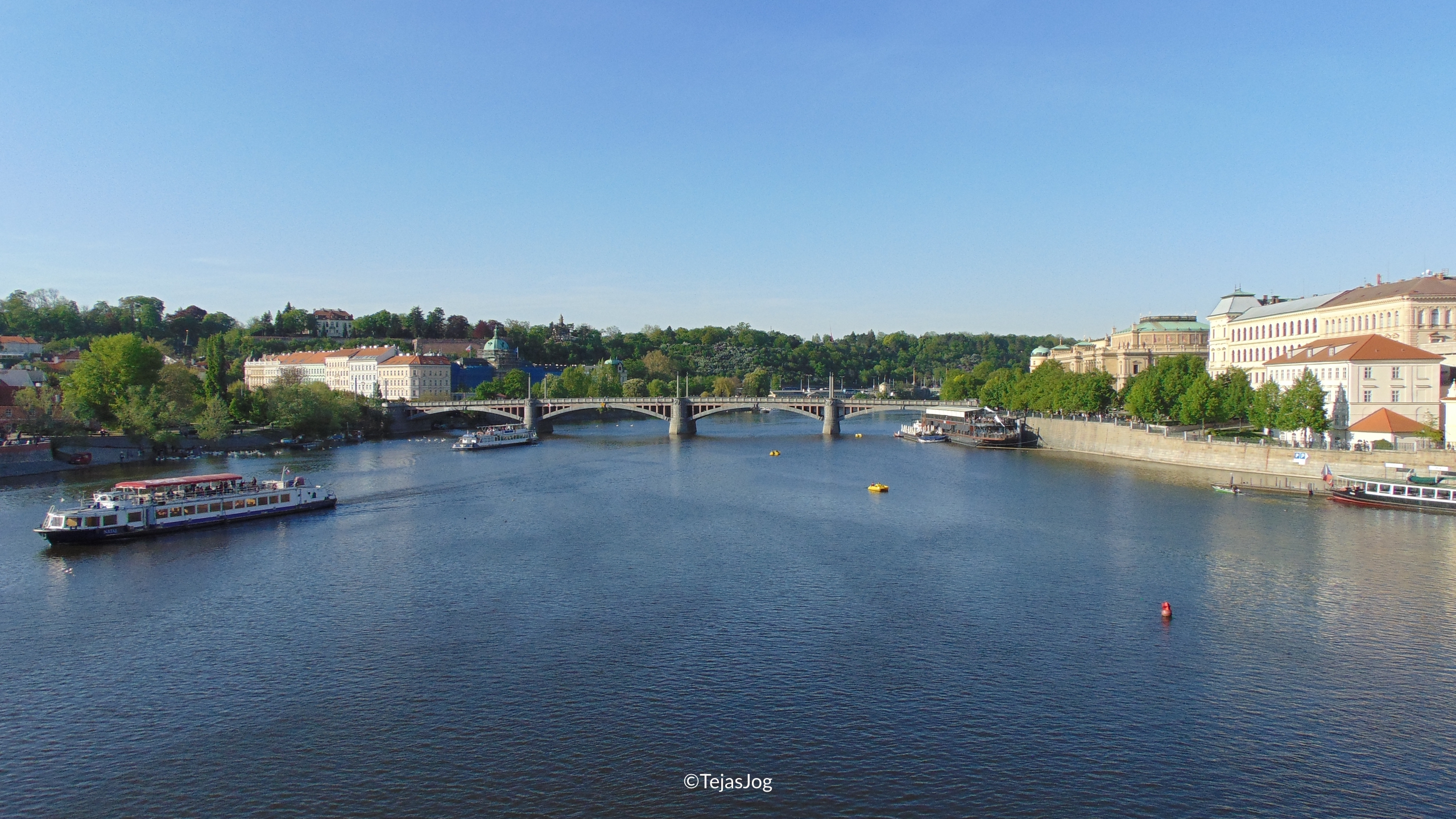 Crossing the Vltava River on the Charles Bridge