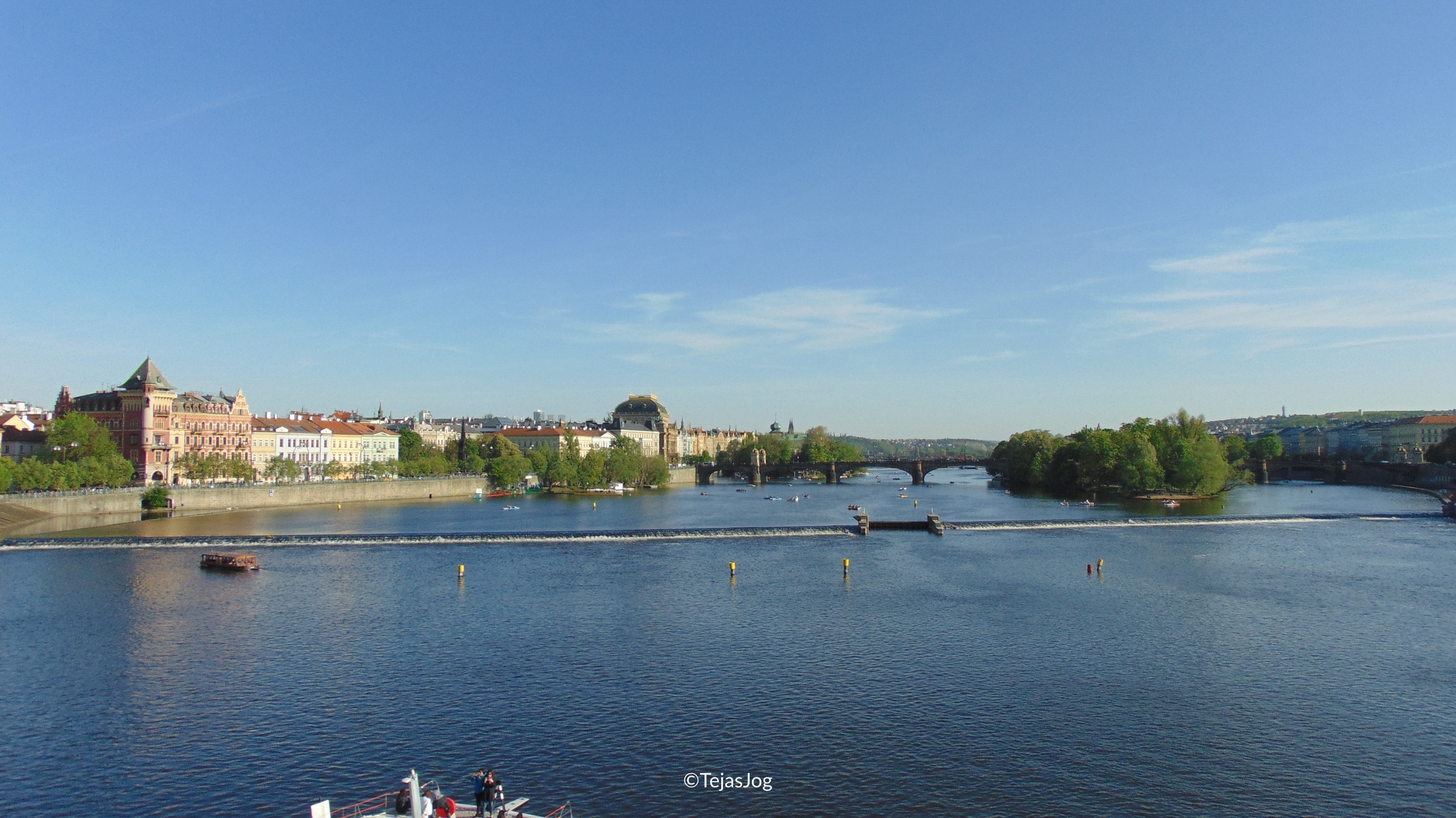 Crossing the Vltava River on the Charles Bridge